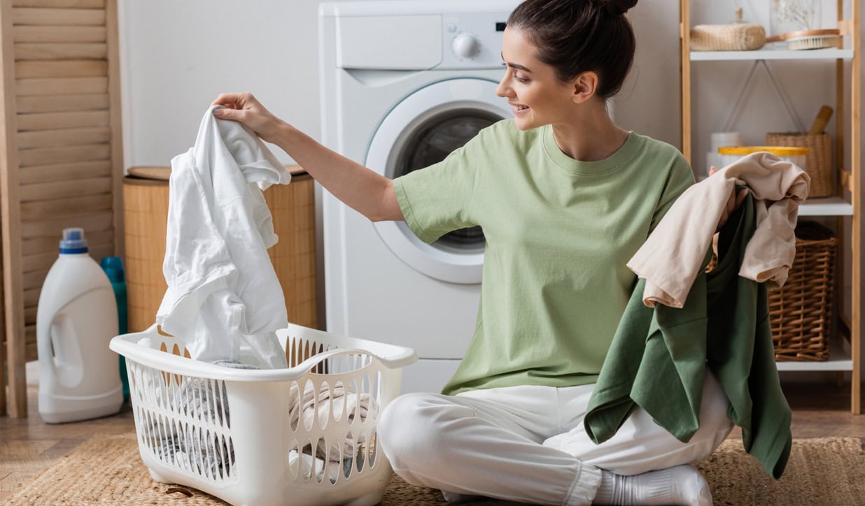 Separate white clothes from coloured ones before washing